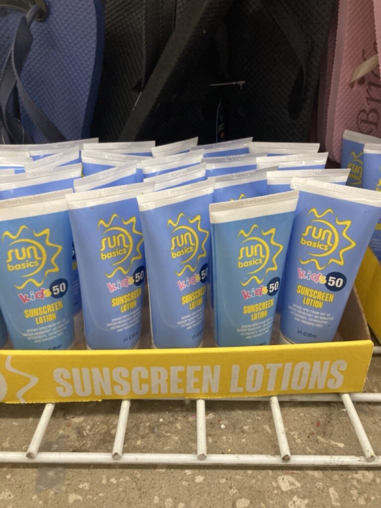 box of sunscreen bottles at the dollar tree