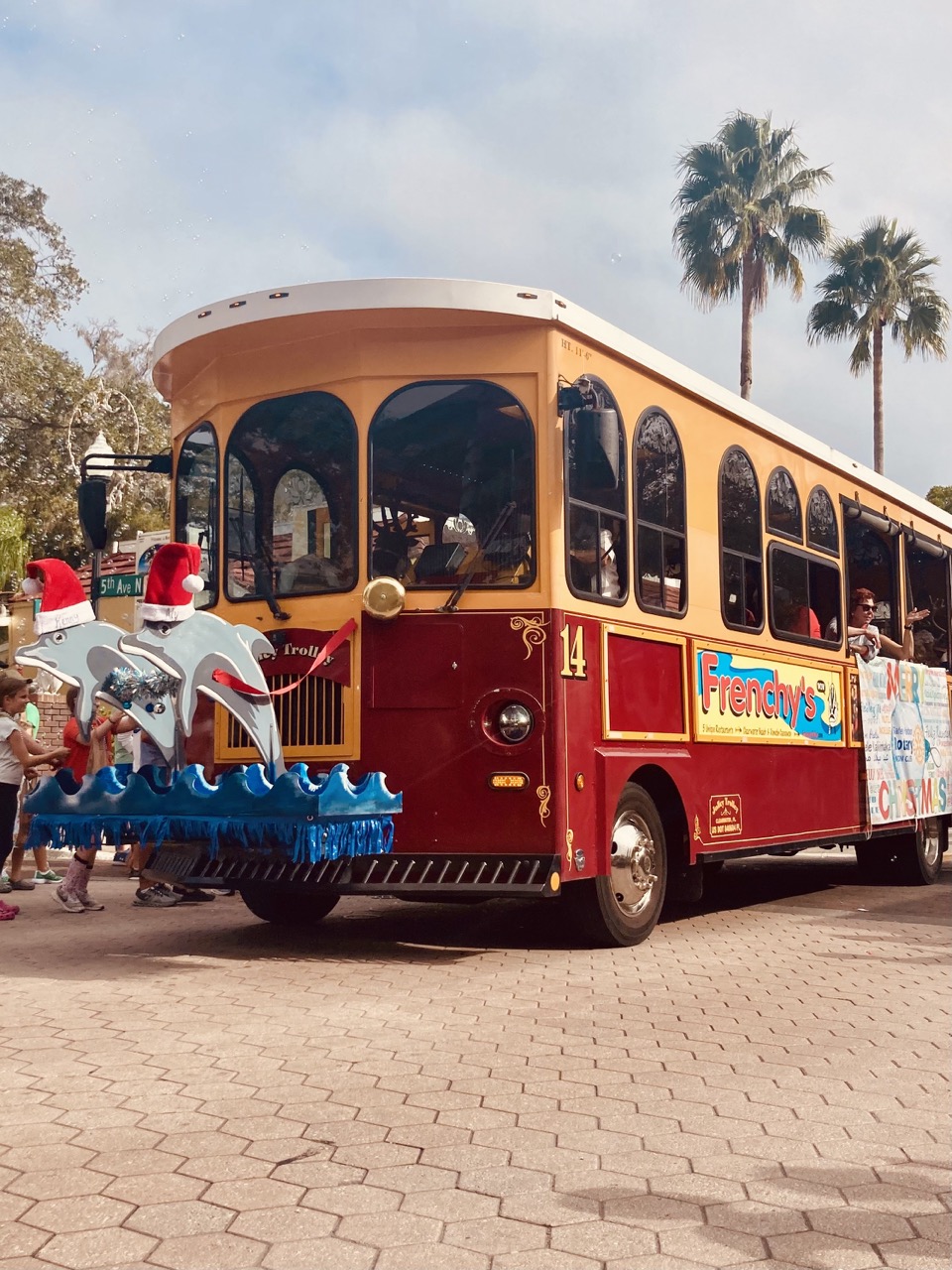 Jolly Trolley with two dolphin decorations coming off the front