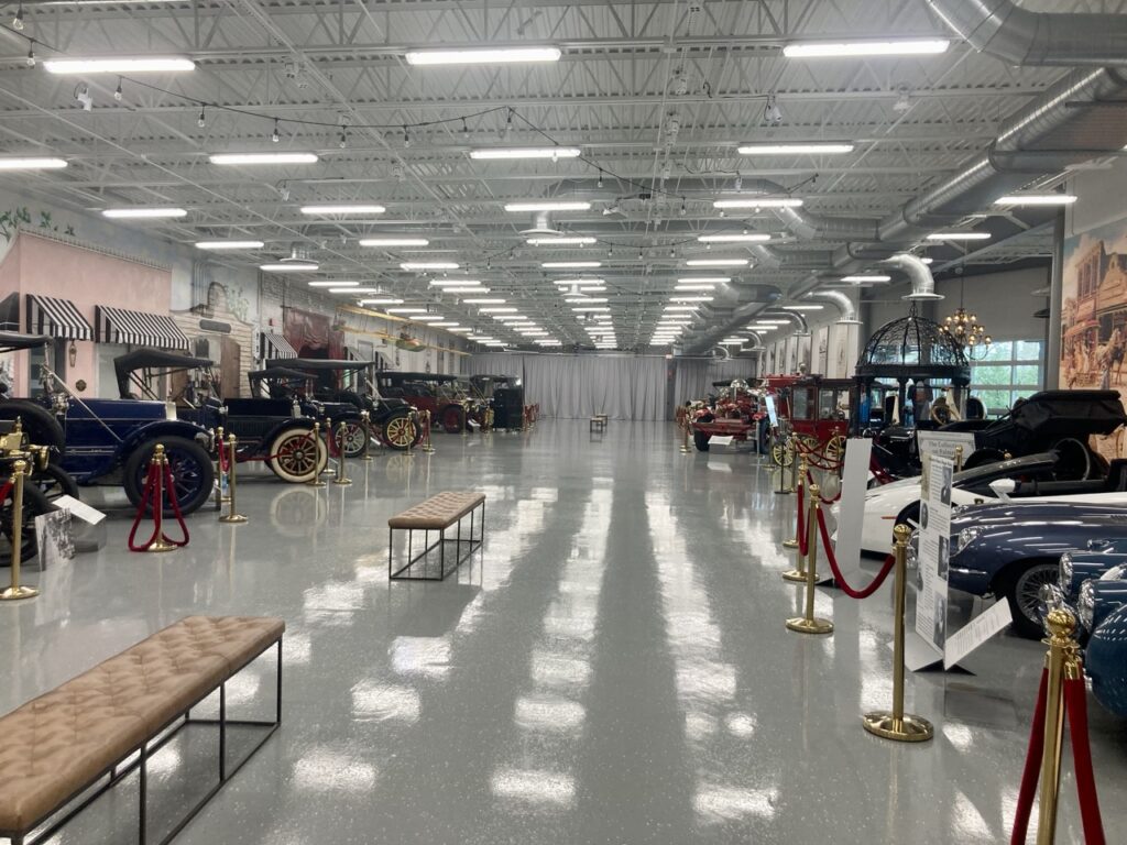 Inside Collection on palmetto in Clearwater showing a big open room with the walls lined with old antique cars