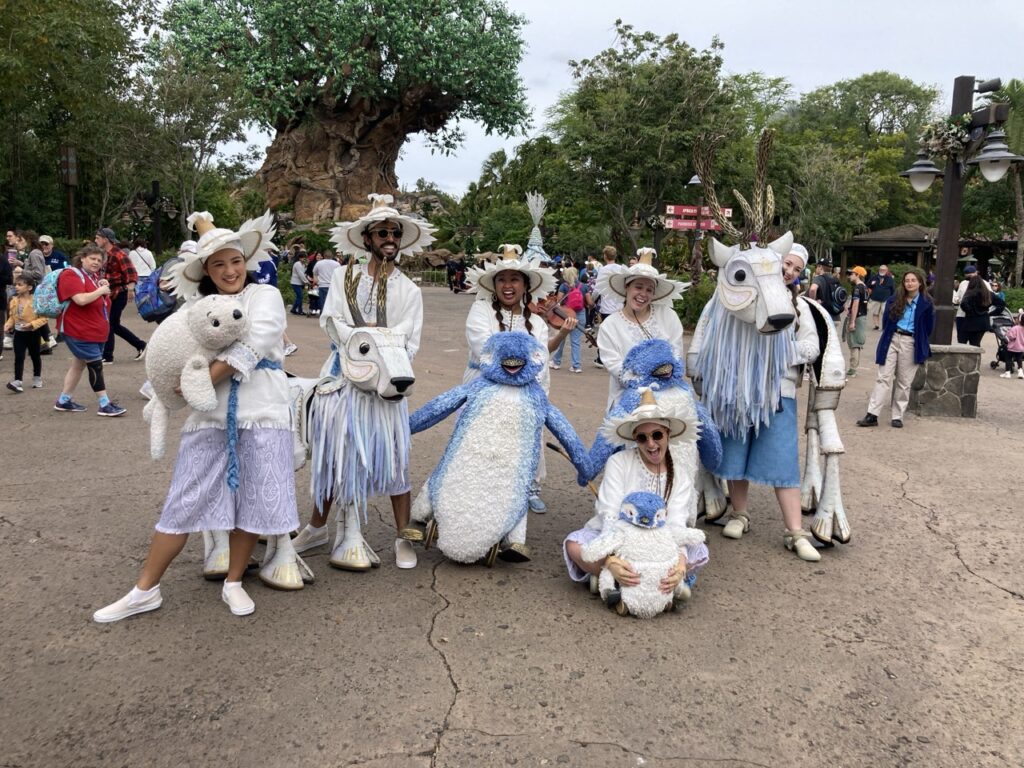 merry menagerie at animal kingdom - blue and white puppet animals with their puppeteer