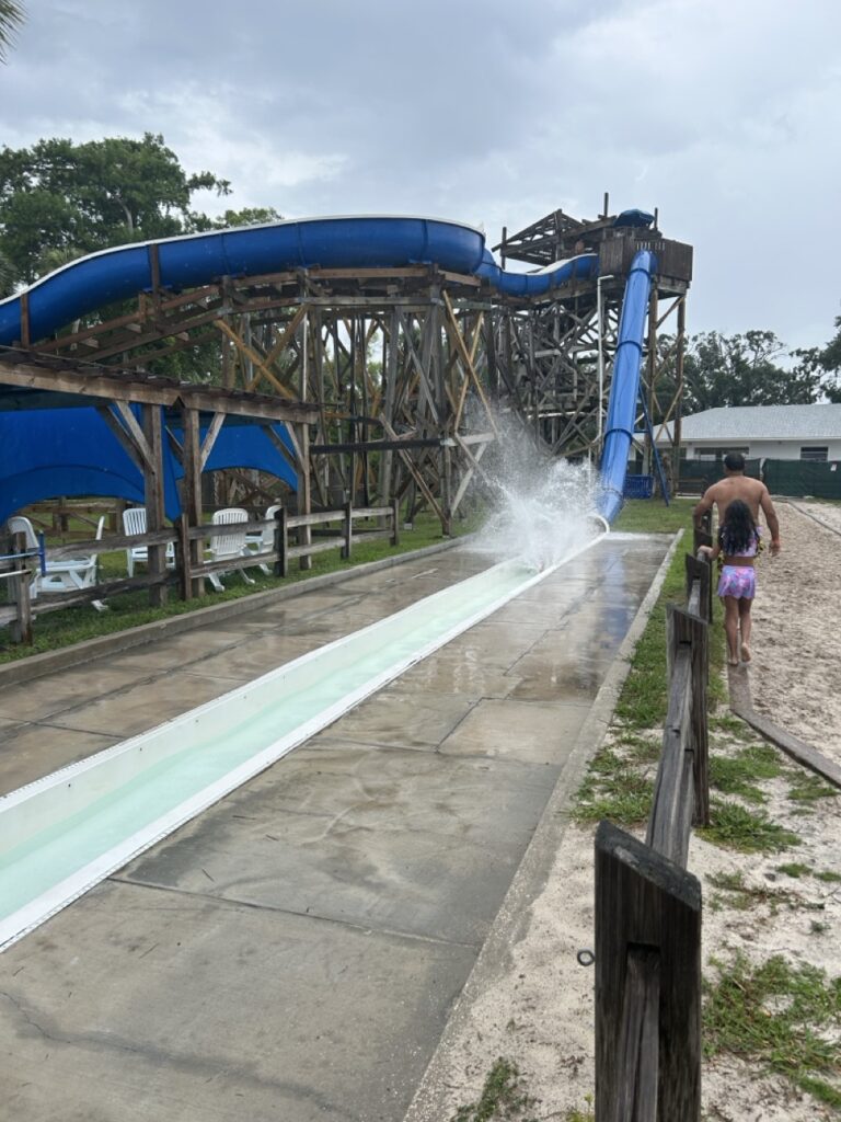 water slide with a splash of a person going down at weeki wachee springs